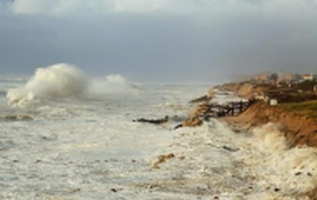 MODIFIED ISPH METHOD FOR MODELING THE WAVES INTERACTION WITH THE COASTAL PROTECTION STRUCTURES